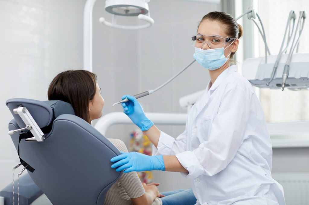 Female_Dentist_Working_In_Clinic_original_545418 72dpi