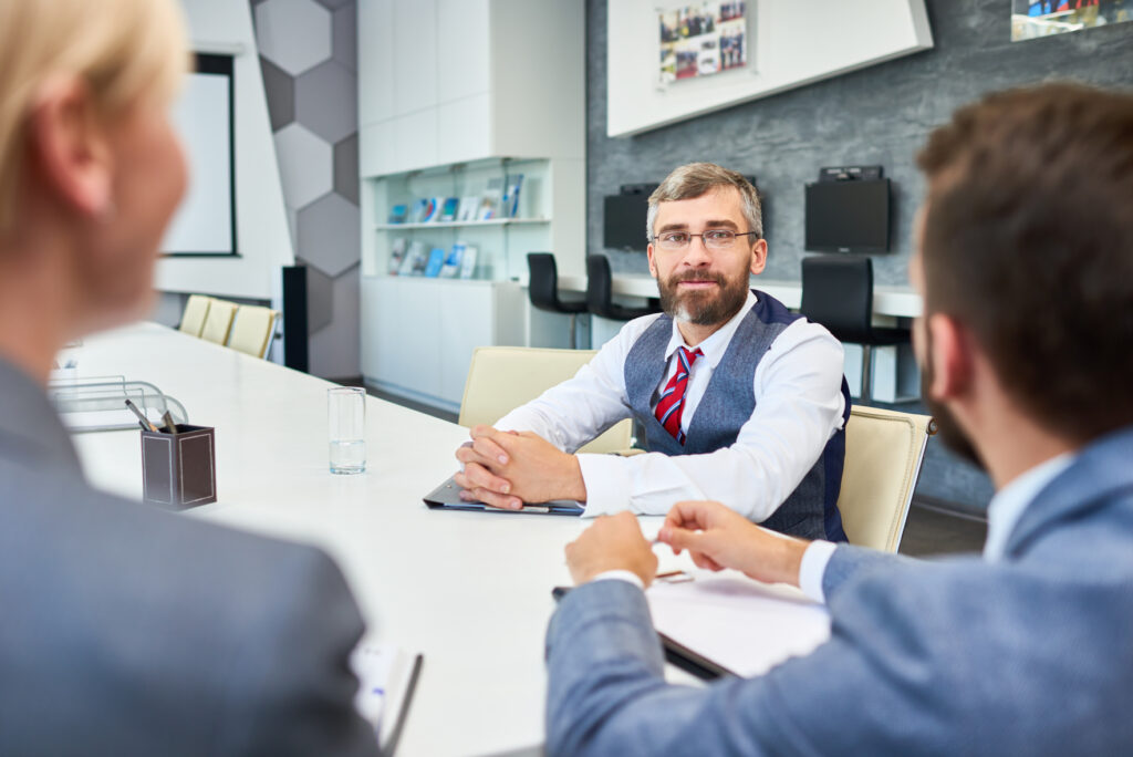 Mature_Businessman_Listening_To..._original_604049 72dpi